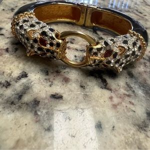 Authentic Kenneth Jay Lane gold with black spots double head leopard bracelet